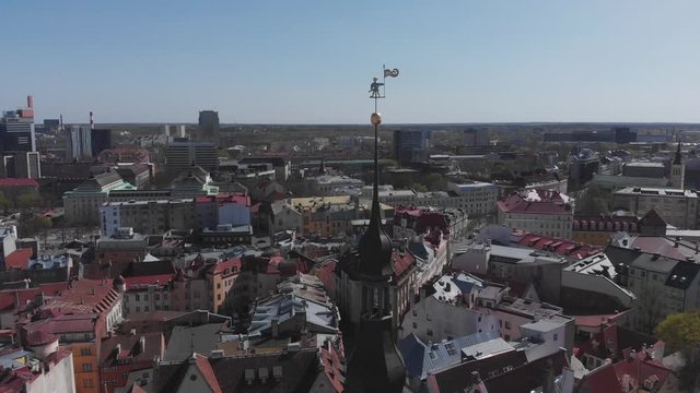 View top on historic centre of Tallinn in the Estonia. Red roofs of the old houses of the European city Tallinn. The ancient architecture. Roof with wings.