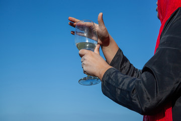 A woman playing the glass