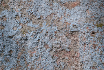 old chipped plaster on the concrete wall, chipped paint, abstract concrete, blue texture, background