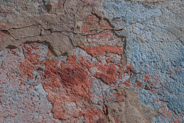 old chipped plaster on the concrete wall, chipped paint, abstract concrete, texture, background