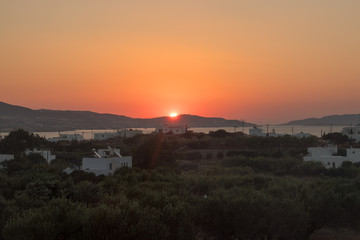 Sun rise in Pollonia village Milos