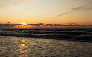 Baltic sea at sunset with waves