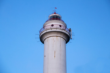 the top of the old lighthouse against the sky