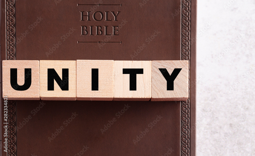 Sticker unity spelled in blocks on a leather holy bible - Stickers