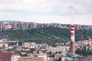 Brno. Czechia. May 2019. Panorama of Brno. City roofs and Czech flag.