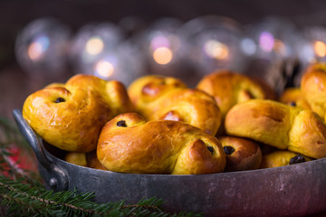 A tray of freshly baked homemade swedish traditional saffron buns