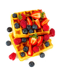 waffles with berries isolated on white