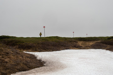 person hiking in winter