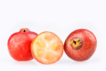 Psidium cattleianum - Strawberry guavas. White background