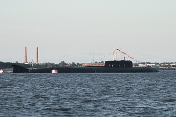 Large Russian nuclear submarine stands at the parade in Kronstadt at the parade