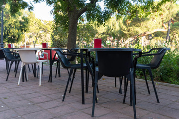 Chairs and tables on a terrace