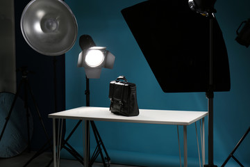 Shooting of men's bag for product promotion in photo studio