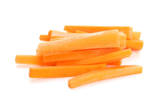 Pile of fresh carrot sticks isolated on white