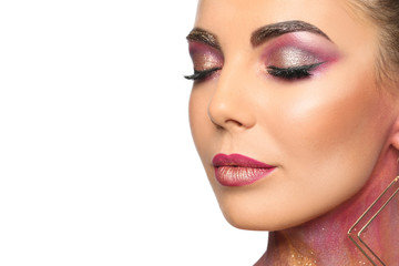 Sexy young woman with glitter makeup on white background, closeup