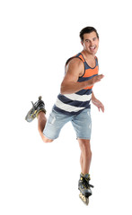 Handsome young man with inline roller skates on white background