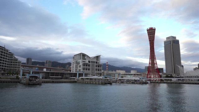 View from the water of the port and the buildings of Kobe city. static shot