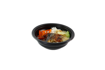 Japanese food bowl Saba rice, boiled vegetables, parsley, carrot, Japanese rice line in a black bowl on a white background Ready-made food in a convenience store to buy rice boxes