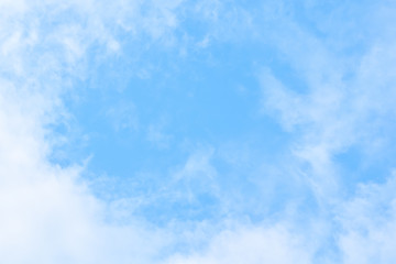 Naklejka na ściany i meble Soft blue sky background with white fluffy cloudscape nature background