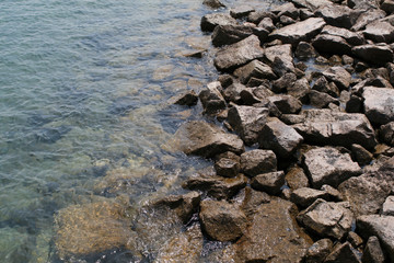 View of a rocky coast in the morning at Khao Laem Ya–Mu Ko Samet National Park, Rayong province, Thailand