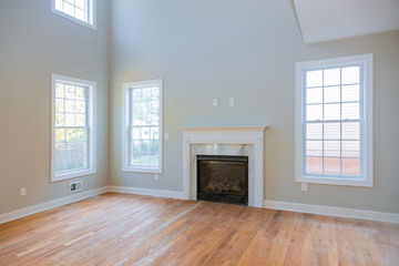 Interior new house construction fireplace in light room