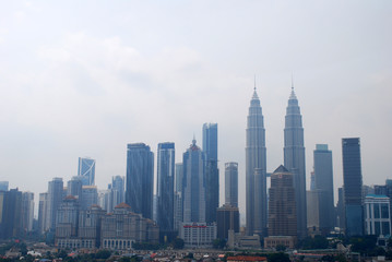 Fototapeta na wymiar Kuala Lumpur, Malaysia city skyline witth thick haze.