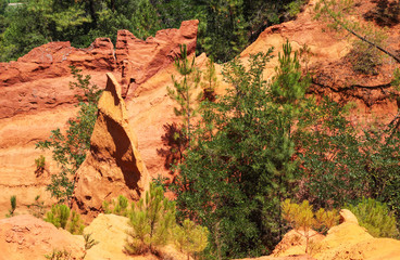 Roussillon, red rocks colorful ochre canyon in Provence, landscape of France.