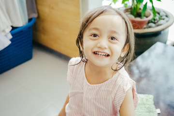 Happy smiling Asian kid. Face expression concept.