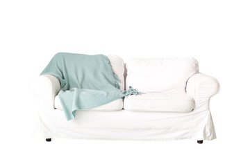 Obraz na płótnie Canvas White sofa with blue blanket on it, isolated on white. Sofa with fabric upholstery