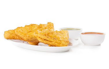 Indian Fried Snack Bread Pakora. It is also known as bread bhaji. A common street food, it is made from bread slices, gram flour, and spices among other ingredients