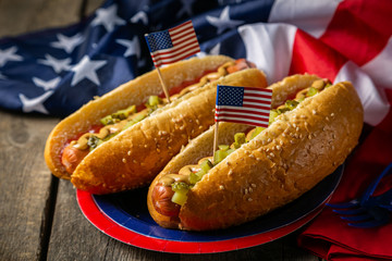 USA national holiday Labor Day, Memorial Day, Flag Day, 4th of July - hot dogs with ketchup and mustard on wood background