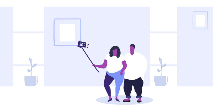 fat obese couple using selfie stick overweight man woman taking photo on smartphone camera african american coworkers team standing together modern office interior sketch full length horizontal