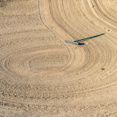 Square Close up of golf course sand bunker with a circular pattern created by the rake