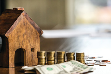 Concept of saving money for to buy home hire real estate business