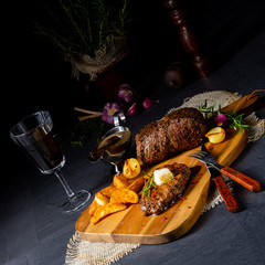 Butter Beef Steak with herbs and potato wedges