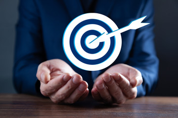 man hand target in screen on brown background