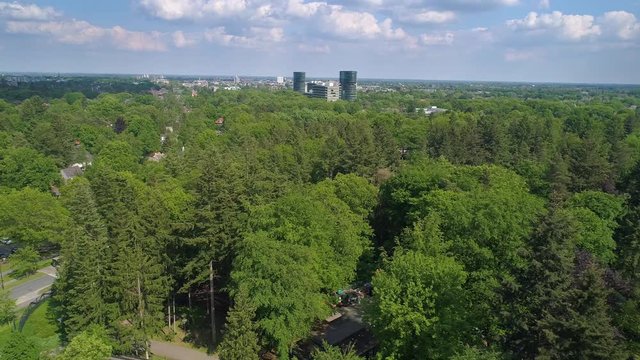 Aerial of the city of Apeldoorn, Netherlands as seen from Berg and Bos. A Beautiful Lush Green Forest