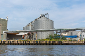 Fototapeta na wymiar an grain silos are located in a transhipment port