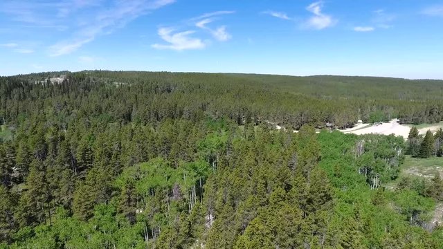 Beautiful landscape of Beartrap Meadow on sunny day. Wyoming USA. Aerial traveling