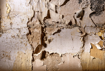 Old wall with cracked paint painting texture background
