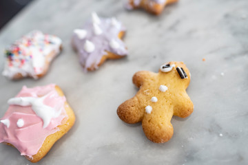 Happy time for kids are preparing the dough, bake cookies in the kitchen, gingerbread man cookies,Christmas baking preparation. 