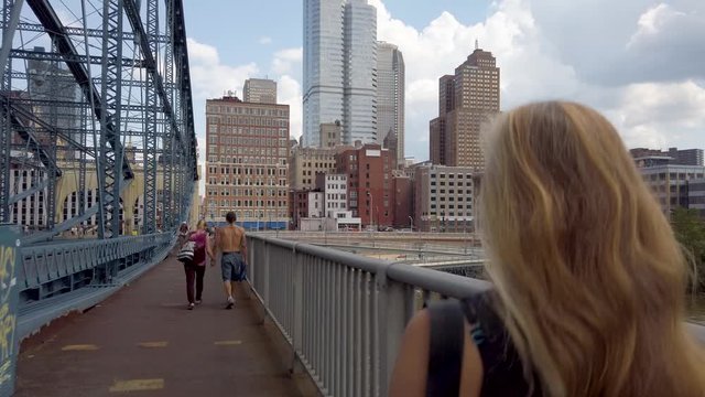Walking over the Smithfield bridge in Pittsburgh, PA.