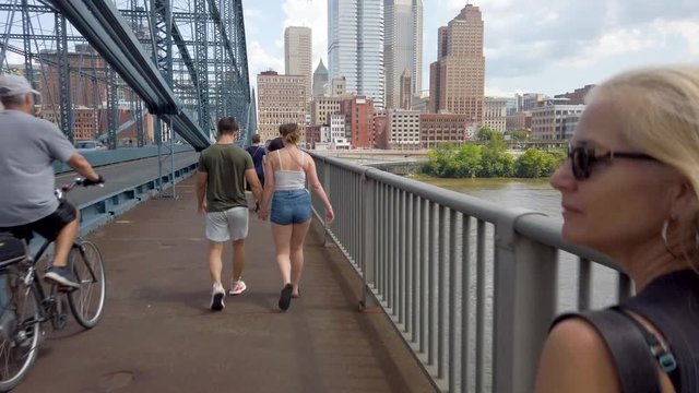 Walking over the Smithfield bridge in Pittsburgh, PA.