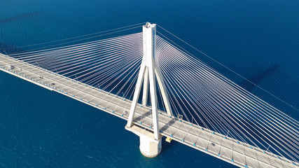 Aerial drone photo of modern cable anti seismic bridge crossing deep blue sea