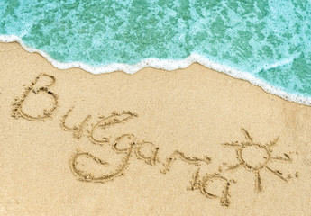 Bulgaria title on the light sand beach near the black sea coast.