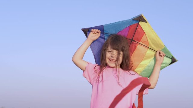 Child and colorful kite.