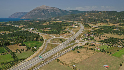 Aerial drone photo of modern motorway roundabouts of Ionia Odos near famous cable bridge of Rio -...