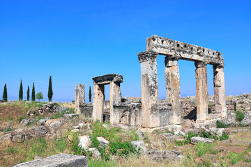 Fototapeta na wymiar Columns on Frontinus street, Hierapolis, Pamukkale, Turkey