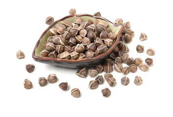 Organic Wingless Moringa (Moringa oleifera) seeds on white background