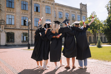 Graduates looking at their university for the last time.