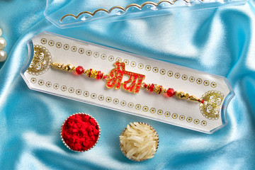 raksha bandhan bhaiya rakhi on velvet texture background